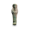 Pale blue faience shabti, Ptolemaic Period 332–30 B.C., funerary figure with agricultural implements.