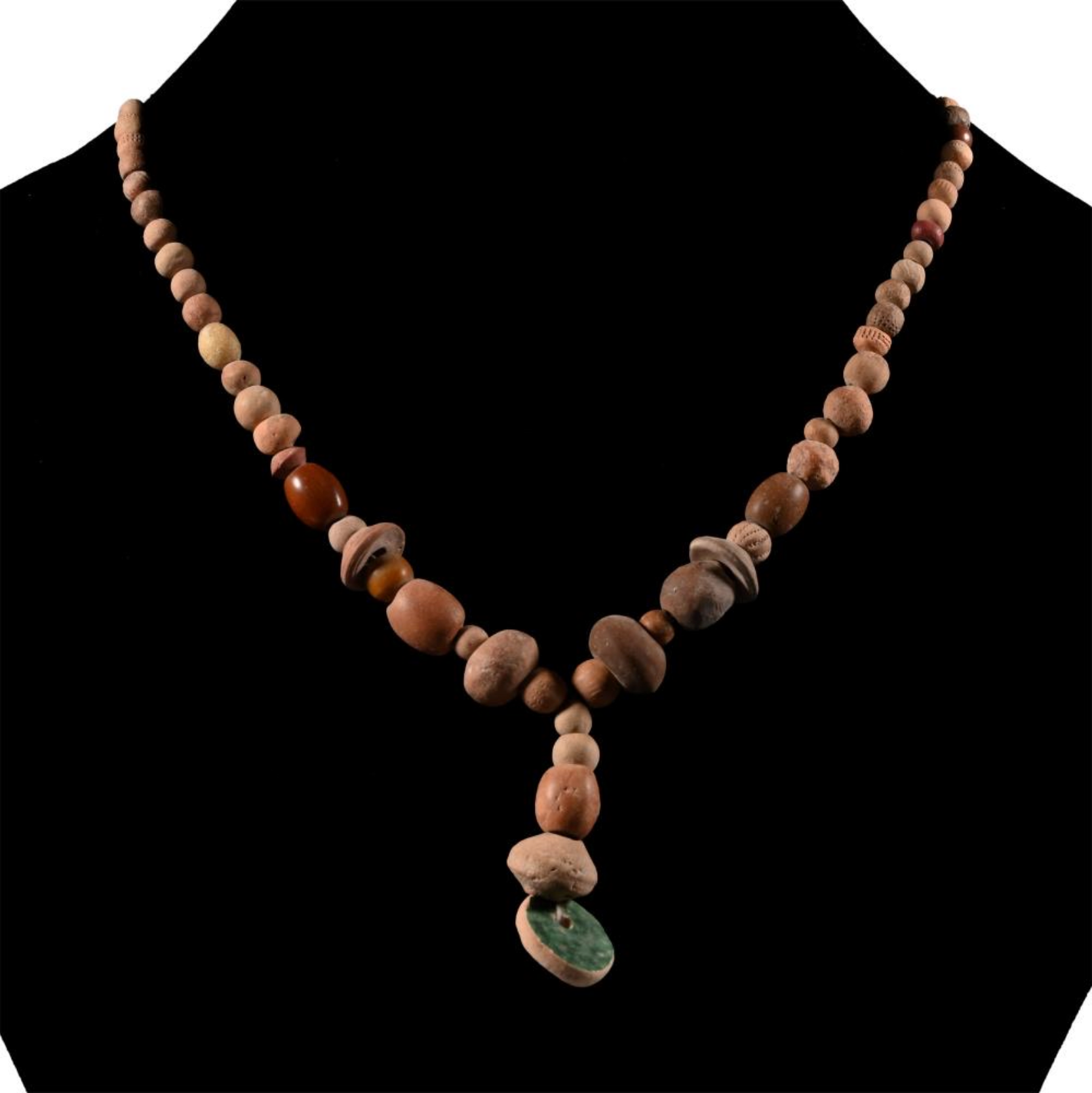 Western Asiatic mixed bead necklace, 1st Millennium B.C. and later, restrung terracotta and ceramic beads.
